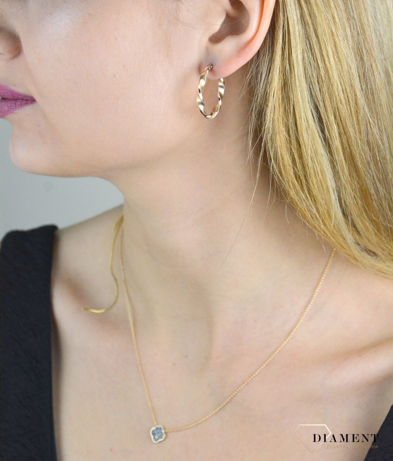 Złote kolczyki damskie 375 zakręcone owale KL 11716 375.jpg